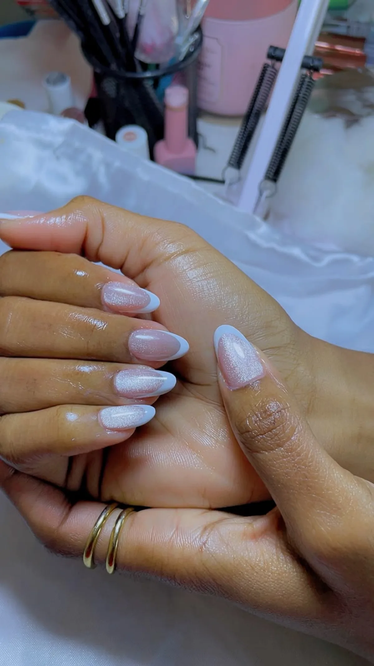 Long sculpted nails finished with a high shine gel top coat